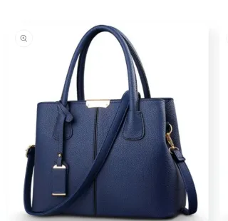 Bolso azul de mano y hombro