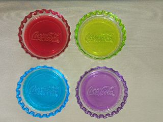 Coca-Cola 4 piattini tappo bottiglia