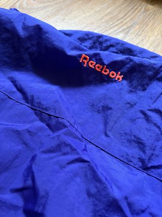 Chaqueta Reebok Morada y Plateada