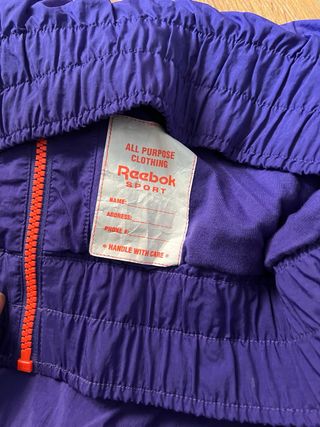 Chaqueta Reebok Morada y Plateada