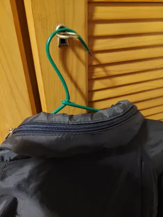 Chubasquero caballero negro