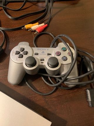 PlayStation 2 Slim argentata + 7 giochi