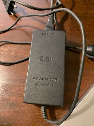 PlayStation 2 Slim argentata + 7 giochi