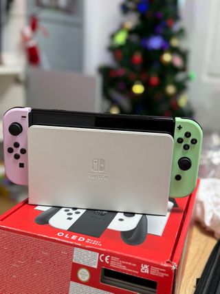 Nintendo Switch OLED + juegos y mandos