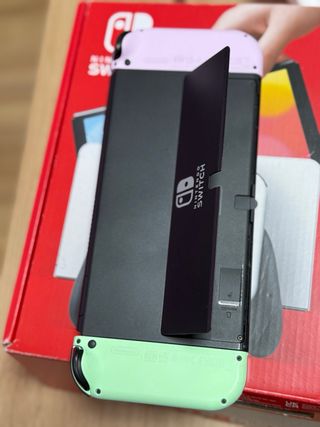 Nintendo Switch OLED + juegos y mandos