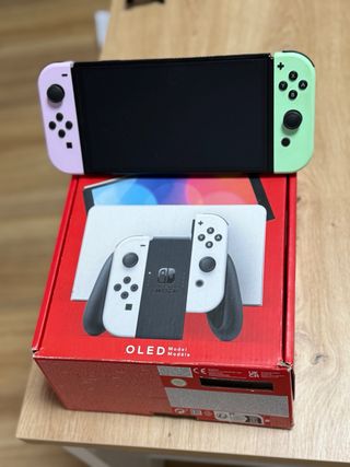 Nintendo Switch OLED + juegos y mandos