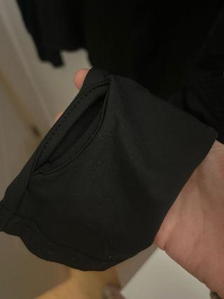 Top deportivo Shein manga larga negro