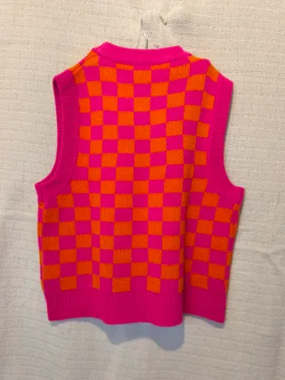 Chaleco de punto cuadros naranja y rosa