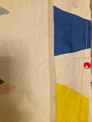 Copripiumino multicolor con triangoli