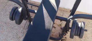 Banco de pesas con discos