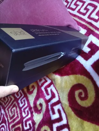 Plancha GHD Platinum Negra y Dorada