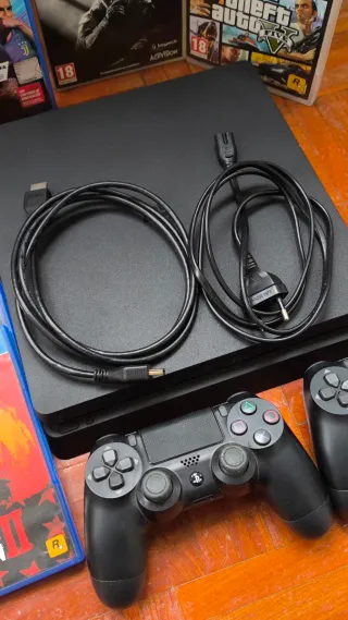 PS4 (PlayStation 4) Nera + 2 Controller + 7 Giochi