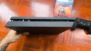 PS4 (PlayStation 4) Nera + 2 Controller + 7 Giochi