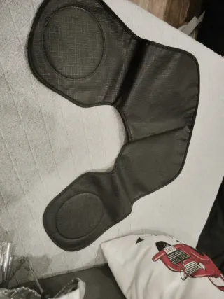 Capa con plomos para cortar el pelo