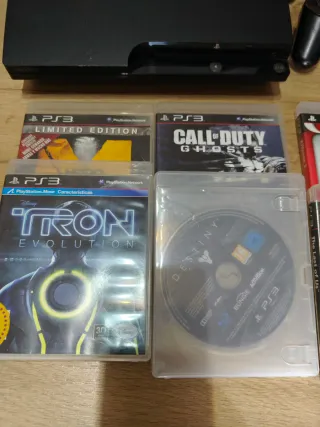 Consola PS3 Negra con 2 mandos y juegos