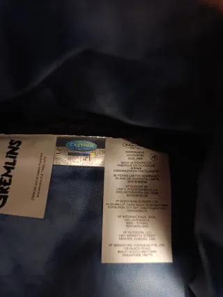 Mochila Eastpak Gremlins Marrón y Blanca