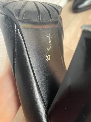 Stivali alti in pelle con tacco