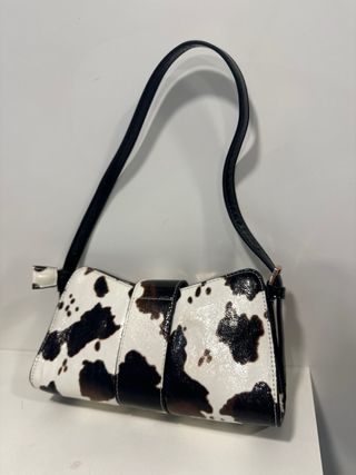 Bolso vaca blanco y negro