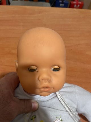 Muñeco bebé con chupete