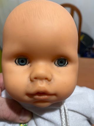 Muñeco bebé con chupete