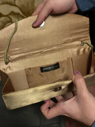 Bolso de mano dorado para mujer