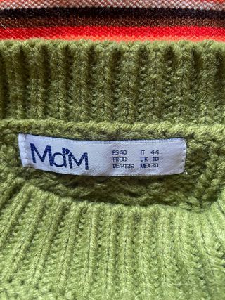 Jersey de punto verde con diseño