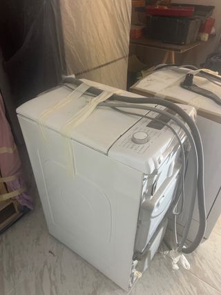 Lavadora blanca usada