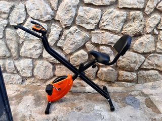 Bicicleta estática plegable naranja fitness