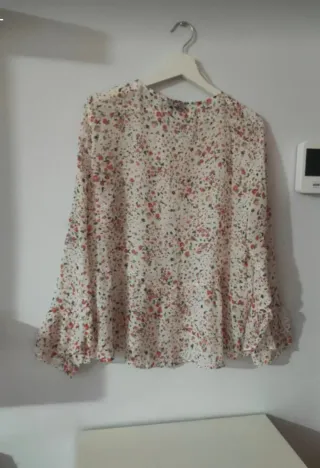 Blusa estampada manga larga