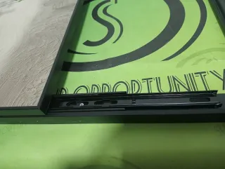 Cuadro decorativo con ramas y hojas verdes