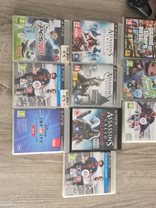 PS3 Slim CECH-3004A + 4 controller + 10 giochi