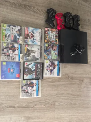 PS3 Slim CECH-3004A + 4 controller + 10 giochi