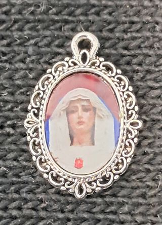 Lote 5 medallas religiosas y náuticas