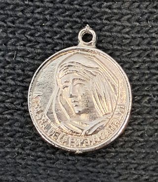 Lote 5 medallas religiosas y náuticas