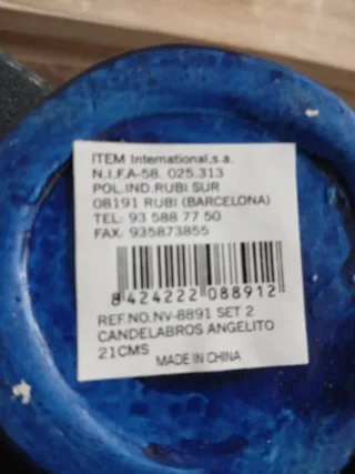 Candelabro, figura angelito con jarrón azul