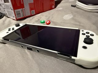 Nintendo Switch OLED Blanca mas pro controller