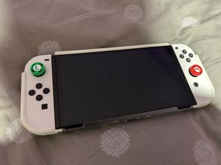 Nintendo Switch OLED Blanca mas pro controller