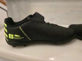 Botín de fútbol Kipsta niño/niña negro/verde