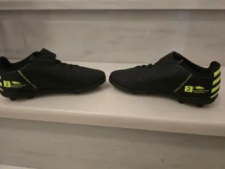 Botín de fútbol Kipsta niño/niña negro/verde