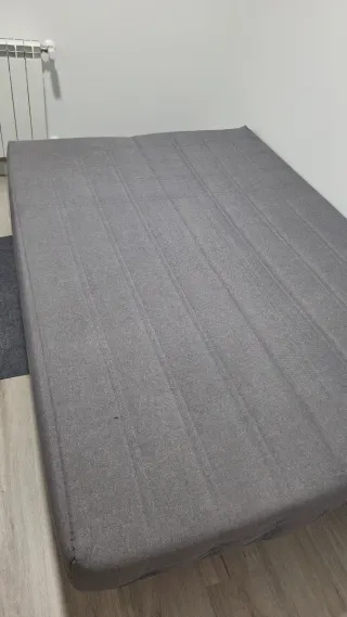 Sofá cama gris tela