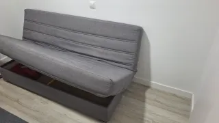 Sofá cama gris tela