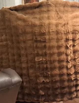 Manta sofá elegante y acogedora sin estrenar