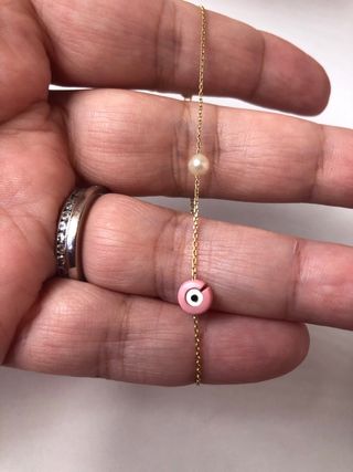 Pulsera fina oro 750 con perla y ojo turco