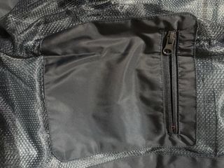 Chaqueta chubasquero azul marino