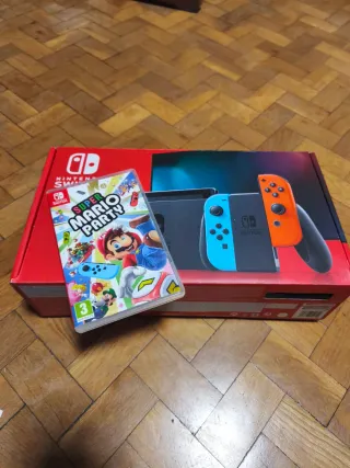 Nintendo Switch Azul y Rojo Completa y juego Mario