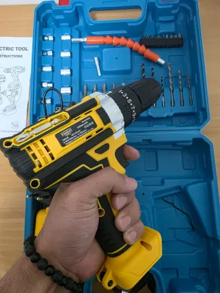 Taladro eléctrico con accesorios