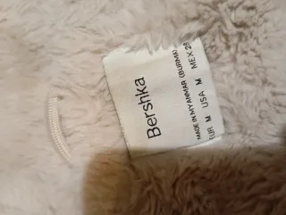 Chaqueta de pelo beige con capucha