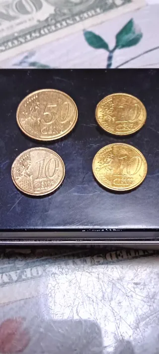 Monete da 50 centesimi e 10 centesimi di euro