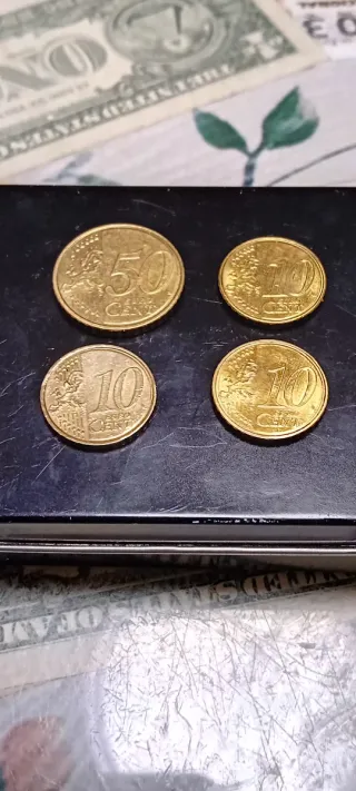 Monete da 50 centesimi e 10 centesimi di euro