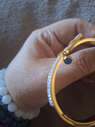 Pulsera tipo caña acero dorada con brillantes